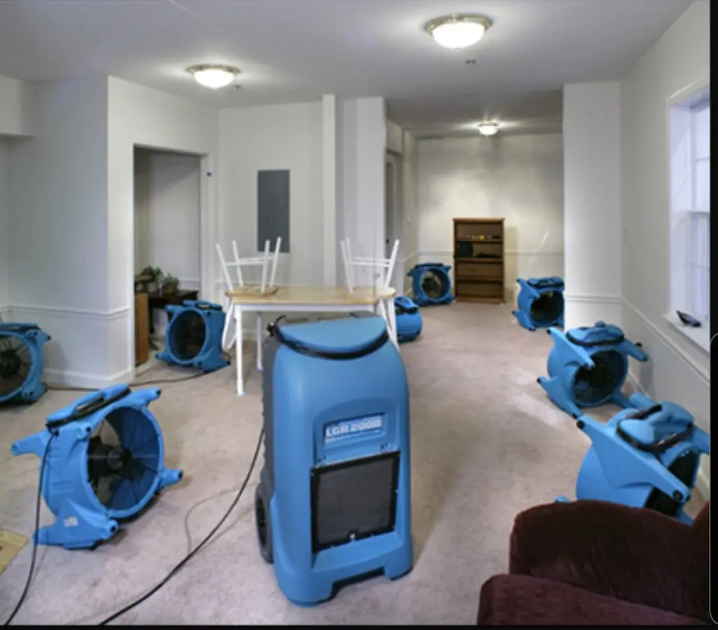 Air movers and dehumidifier setup for Water Extraction & Removal in Mound